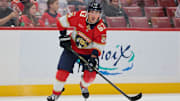 Nov 1, 2025; Sunrise, Florida, USA; Florida Panthers left wing Brad Marchand (63) moves the puck against the Dallas Stars during the second period at Amerant Bank Arena. Mandatory Credit: Sam Navarro-Imagn Images