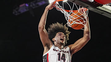 Nov 4, 2024; Athens, Georgia, USA; Georgia Bulldogs forward Asa Newell (14) dunks against the Tennessee Tech Golden Eagles at Stegeman Coliseum. Mandatory Credit: Dale Zanine-Imagn Images