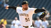 Jun 11, 2025; Pittsburgh, Pennsylvania, USA;  Pittsburgh Pirates closing pitcher David Bednar throws to the Miami Marlins at PNC Park. Mandatory Credit: Philip G. Pavely-Imagn Images