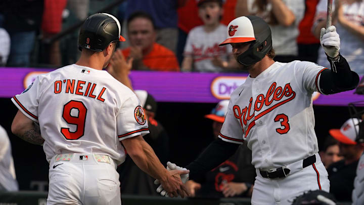 Mar 26, 2026; Baltimore, Maryland, USA; Baltimore Orioles outfielder Tyler O’Neil (9) greeted by second baseman Blaze Alexander (3) after scoring a run during the eighth inning against the Minnesota Twins at Oriole Park at Camden Yards. Mandatory Credit: Mitch Stringer-Imagn Images