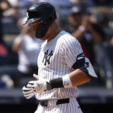 New York Yankees right fielder Aaron Judge (99) crosses the plate after hitting a two home run against the Chicago Cubs during the ninth inning at Yankee Stadium on July 12. 