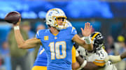 Nov 9, 2025; Inglewood, California, USA; Los Angeles Chargers quarterback Justin Herbert (10) passes the ball against the Pittsburgh Steelers during the second quarter of the game at SoFi Stadium. Mandatory Credit: Jayne Kamin-Oncea-Imagn Images