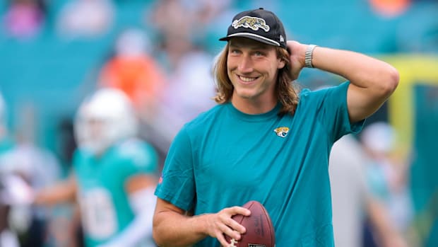 Jacksonville Jaguars quarterback Trevor Lawrence looks on from the field before the game against the Miami Dolphins.