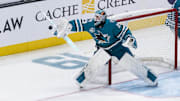Nov 23, 2024; San Jose, California, USA; San Jose Sharks goaltender Mackenzie Blackwood (29) deflects a shot by a Buffalo Sabres player during the third period at SAP Center in San Jose. Mandatory Credit: John Hefti-Imagn Images