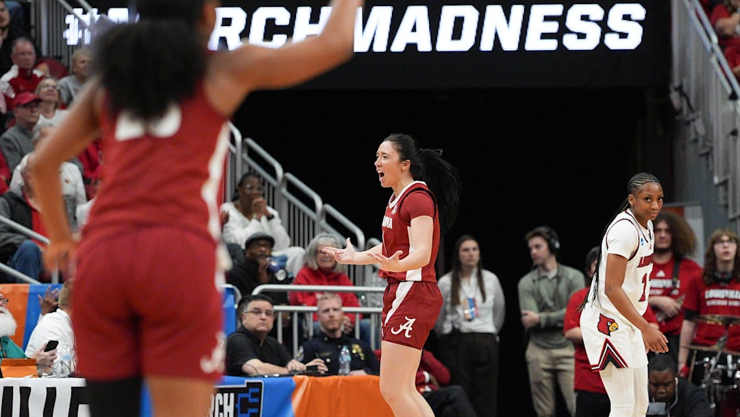 Alabama Crimson Tide guard Ace Austin (1) celebrates her second straight three-point shot against Louisville during the 2026 NCAA Women's March Madness Second Round basketball at the KFC Yum Center In Louisville, Kentucky. March 23, 2026.