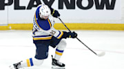 Apr 21, 2025; Winnipeg, Manitoba, CAN;St. Louis Blues right wing Jimmy Snuggerud (21) warms up before a game against the Winnipeg Jets in game two of the first round of the 2025 Stanley Cup Playoffs at Canada Life Centre. Mandatory Credit: James Carey Lauder-Imagn Images