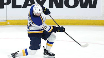 Apr 21, 2025; Winnipeg, Manitoba, CAN;St. Louis Blues right wing Jimmy Snuggerud (21) warms up before a game against the Winnipeg Jets in game two of the first round of the 2025 Stanley Cup Playoffs at Canada Life Centre. Mandatory Credit: James Carey Lauder-Imagn Images