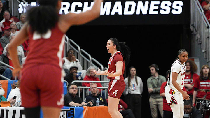 Alabama Crimson Tide guard Ace Austin (1) celebrates her second straight three-point shot against Louisville during the 2026 NCAA Women's March Madness Second Round basketball at the KFC Yum Center In Louisville, Kentucky. March 23, 2026.