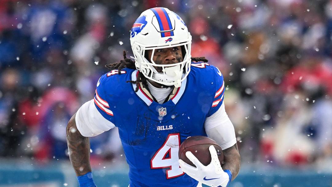 Dec 7, 2025; Orchard Park, New York, USA; Buffalo Bills running back James Cook III (4) carries the ball against the Cincinnati Bengals in the third quarter at Highmark Stadium. Mandatory Credit: Mark Konezny-Imagn Images
