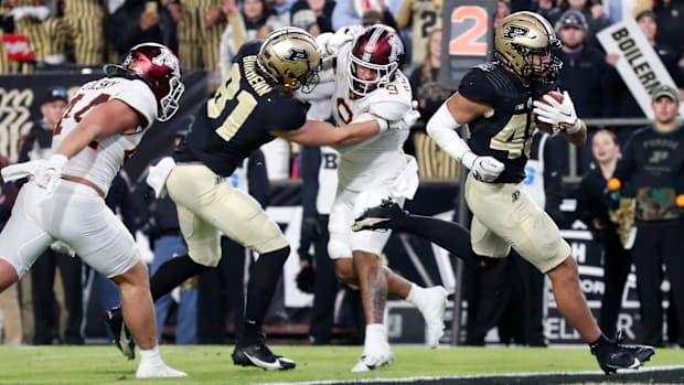 Purdue Boilermakers running back Devin Mockobee (45) runs the ball in for a touchdown 