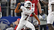 Jan 10, 2025; Arlington, Texas, USA; Texas Longhorns defensive back Jahdae Barron (7) celebrates after a sack during the second quarter of the College Football Playoff semifinal against the Ohio State Buckeyes in the Cotton Bowl at AT&T Stadium
