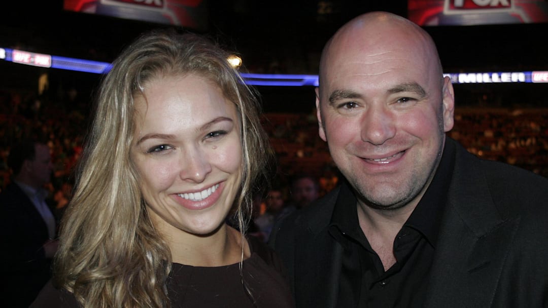 May 5, 2012; East Rutherford, NJ, USA; UFC president Dana White (right) poses with Strikeforce MMA female champion Ronda Rousey during a bout between Johny Hendricks and Josh Koscheck during UFC on Fox 3 at the Izod Center. Mandatory Credit: Joe Camporeale-Imagn Images