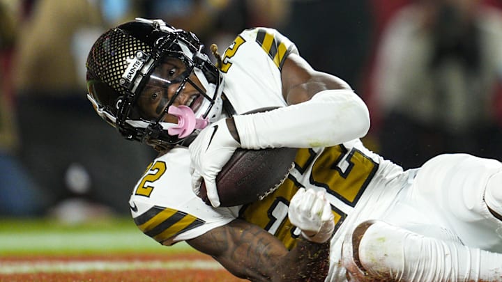 New Orleans Saints receiver Rashid Shaheed catches a touchdown pass.