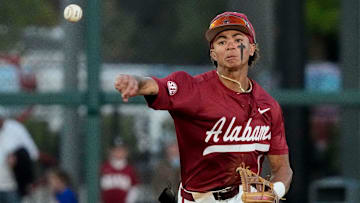 Alabama shortstop Justin Lebron (1) fields and throws to first for an out against Mississippi State at Sewell-Thomas Stadium in Tuscaloosa Friday, April 11, 2025.