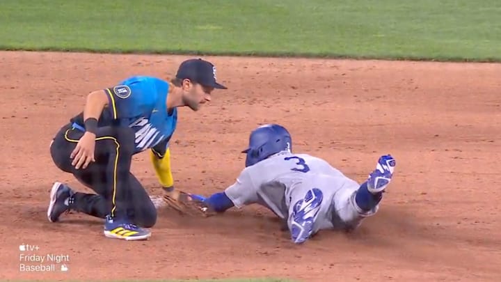 Philadelphia Phillies shortstop Trea Turner tags Los Angeles Dodgers pinch runner Chris Taylor out at second base. Philadelphia Phillies shortstop Trea Turner tags Los Angeles Dodgers pinch runner Chris Taylor out at second base.