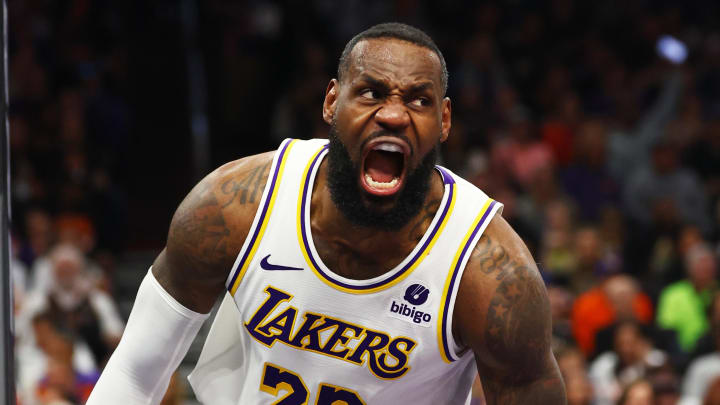 Feb 25, 2024; Phoenix, Arizona, USA; Los Angeles Lakers forward LeBron James (23) reacts as he celebrates a slam dunk against the Phoenix Suns at Footprint Center. Mandatory Credit: Mark J. Rebilas-USA TODAY Sports