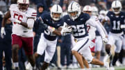 Penn State's Daequan Hardy (25) returns a punt 56 yards for a touchdown during the first half of a