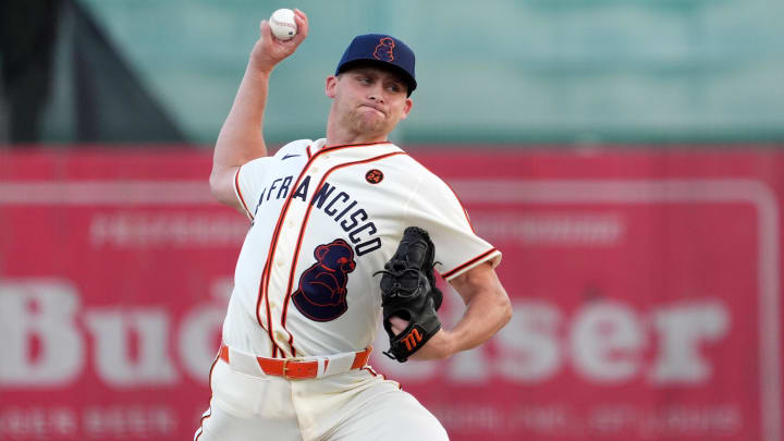 Jun 20, 2024; Fairfield, Alabama, USA; San Francisco Giants pitcher Keaton Winn (67) throws during the 1st inning against the St. Louis Cardinals in the MLB at Rickwood Field tribute game to the Negro Leagues. Rickwood Field is the oldest baseball stadium in America