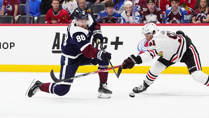 Mar 10, 2025; Denver, Colorado, USA; Chicago Blackhawks center Frank Nazar (91) defends on Colorado Avalanche center Martin Necas (88) in the second period at Ball Arena. Mandatory Credit: Ron Chenoy-Imagn Images