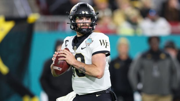 Sam Hartman throws a pass for Wake Forest