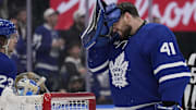Toronto Maple Leafs goaltender Anthony Stolarz grimaces after a collision with Florida Panthers forward Sam Bennett
