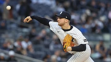 Apr 16, 2025; Bronx, New York, USA;  New York Yankees starting pitcher Clarke Schmidt pitches in the first inning against the Kansas City Royals at Yankee Stadium. 