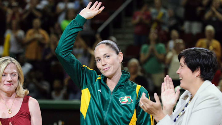 Aug 16, 2012; Seattle, WA, USA; Seattle Storm owners Dawn Trudeau (left) and Lisa Brummel (right) with Seattle Storm guard Sue Bird (middle) prior to the game against the Phoenix Mercury at KeyArena. Mandatory Credit: Steven Bisig-Imagn Images
