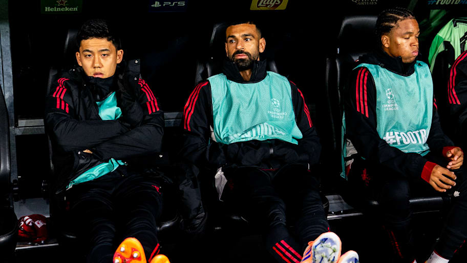 Mohamed Salah (centre) on the bench.