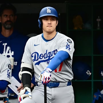 Dave Roberts (right) didn't approve of Shohei Ohtani's (left) decision in the sixth inning. 