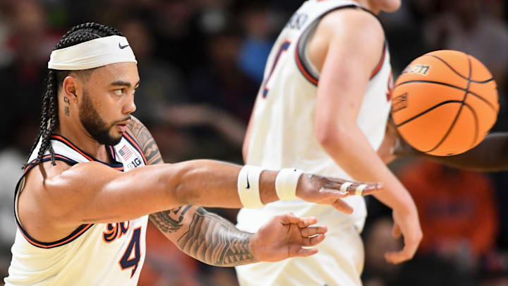 Illinois Fighting Illini guard Kylan Boswell (4) passes the ball Thursday, March 19, 2026, during the NCAA Men’s Basketball Tournament first round game against the Penn Quakers at Bon Secours Wellness Arena in Greenville, South Carolina.