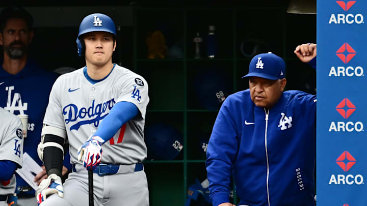 Dave Roberts (right) didn't approve of Shohei Ohtani's (left) decision in the sixth inning. 