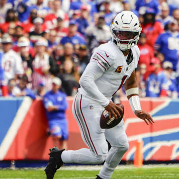 Sep 8, 2024; Orchard Park, New York, USA; Arizona Cardinals quarterback Kyler Murray (1) rolls out looking to throw the ball against the Buffalo Bills during the first half at Highmark Stadium. Mandatory Credit: Gregory Fisher-Imagn Images