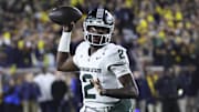 Oct 26, 2024; Ann Arbor, Michigan, USA;  Michigan State Spartans quarterback Aidan Chiles (2) passes in the first half against the Michigan Wolverines at Michigan Stadium. Mandatory Credit: Rick Osentoski-Imagn Images