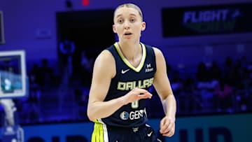 Jul 16, 2025; Arlington, Texas, USA;  Dallas Wings guard Paige Bueckers (5) reacts against the Las Vegas Aces during the second half at College Park Center. Mandatory Credit: Chris Jones-Imagn Images