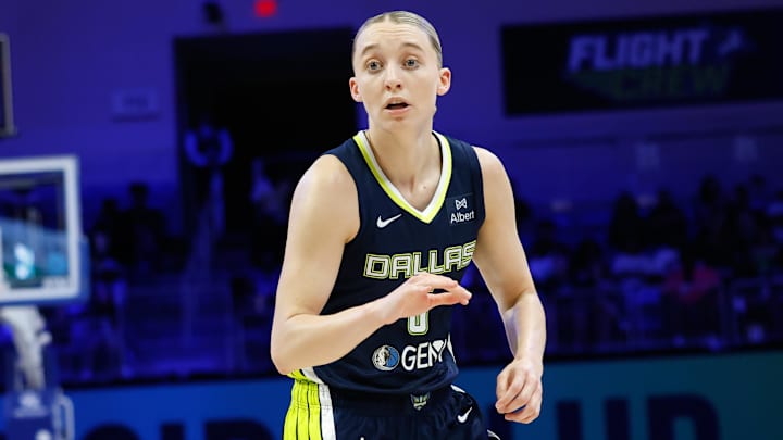 Jul 16, 2025; Arlington, Texas, USA;  Dallas Wings guard Paige Bueckers (5) reacts against the Las Vegas Aces during the second half at College Park Center. Mandatory Credit: Chris Jones-Imagn Images