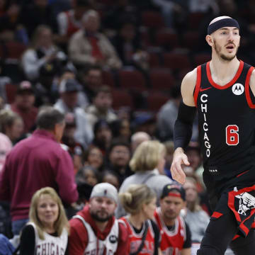 Apr 1, 2024; Chicago, Illinois, USA; Chicago Bulls guard Alex Caruso (6) drives to the basket against the Atlanta Hawks during the first half at United Center. Mandatory Credit: Kamil Krzaczynski-USA TODAY Sports