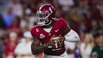 Sep 7, 2024; Tuscaloosa, Alabama, USA; Alabama Crimson Tide quarterback Jalen Milroe (4) looks for a pass against the South Florida Bulls during the second quarter at Bryant-Denny Stadium. Mandatory Credit: William McLelland-Imagn Images