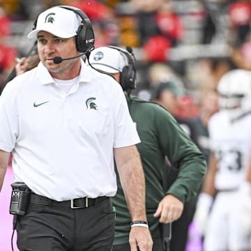 Sep 7, 2024; College Park, Maryland, USA;  Michigan State Spartans head coach Jonathan Smith walks the sidelines during the first half against the Maryland Terrapins at SECU Stadium. Mandatory Credit: Tommy Gilligan-Imagn Images