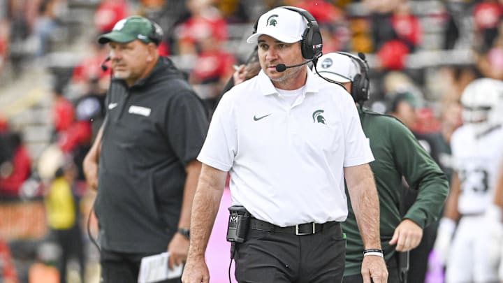 Sep 7, 2024; College Park, Maryland, USA;  Michigan State Spartans head coach Jonathan Smith walks the sidelines during the first half against the Maryland Terrapins at SECU Stadium. Mandatory Credit: Tommy Gilligan-Imagn Images