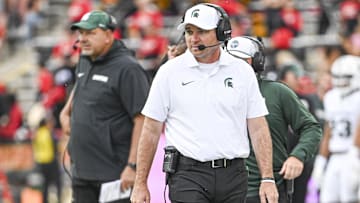 Sep 7, 2024; College Park, Maryland, USA;  Michigan State Spartans head coach Jonathan Smith walks the sidelines during the first half against the Maryland Terrapins at SECU Stadium. Mandatory Credit: Tommy Gilligan-Imagn Images