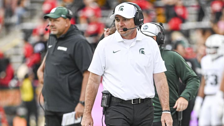 Sep 7, 2024; College Park, Maryland, USA;  Michigan State Spartans head coach Jonathan Smith walks the sidelines during the first half against the Maryland Terrapins at SECU Stadium. Mandatory Credit: Tommy Gilligan-Imagn Images