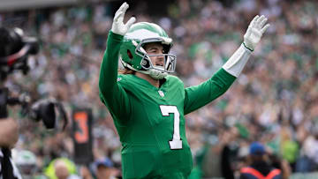 Dec 29, 2024; Philadelphia, Pennsylvania, USA; Philadelphia Eagles quarterback Kenny Pickett (7) reacts to his touchdown pass against the Dallas Cowboys during the second quarter at Lincoln Financial Field. Mandatory Credit: Bill Streicher-Imagn Images