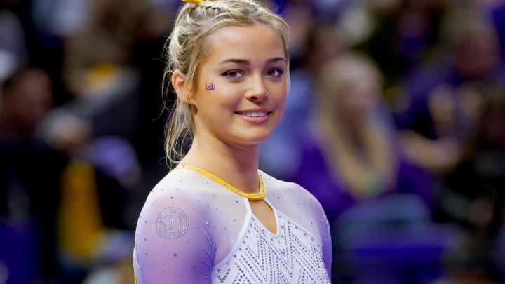 LSU Lady Tigers senior Olivia Dunne smiles before a floor routine against the Arkansas Razorbacks at Pete Maravich Assembly Center.