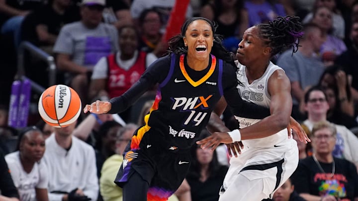 Aces guard Chelsea Gray (12) knocks away the ball from Mercury forward DeWanna Bonner (14) during a game at PHX Arena in Phoenix, on Aug. 15, 2025. Aces guard Chelsea Gray (12) knocks away the ball from Mercury forward DeWanna Bonner (14) during a game at PHX Arena in Phoenix, on Aug. 15, 2025.