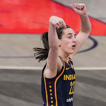 Caitlin Clark had 14 points and 13 assists in Sunday's win over the Wings.