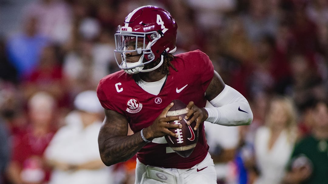 Sep 7, 2024; Tuscaloosa, Alabama, USA; Alabama Crimson Tide quarterback Jalen Milroe (4) looks for a pass against the South Florida Bulls during the second quarter at Bryant-Denny Stadium.