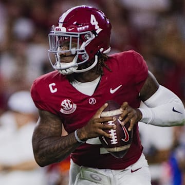 Sep 7, 2024; Tuscaloosa, Alabama, USA; Alabama Crimson Tide quarterback Jalen Milroe (4) looks for a pass against the South Florida Bulls during the second quarter at Bryant-Denny Stadium.