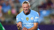 Jul 30, 2024; Orlando, FL, USA;  Manchester City forward Erling Haaland (9) reacts after shot against Barcelona in the first half during a Champions Tour friendly match at Camping World Stadium. Mandatory Credit: Nathan Ray Seebeck-Imagn Images