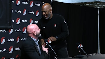 Apr 13, 2025; Portland, Oregon, USA; Portland Trail Blazers head coach Chauncey Billups interacts with Trail Blazers’ general manager Joe Cronin at the conclusion of a press conference before Portland plays their last season game against Los Angeles Lakers at Moda Center. Mandatory Credit: Jaime Valdez-Imagn Images
