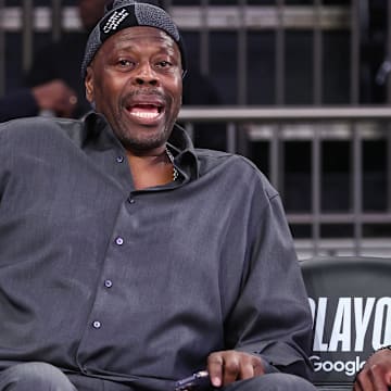 Apr 19, 2025; New York, New York, USA;  Former NBA center Patrick Ewing watches pregame workouts of Game One of the First Round of the NBA Playoffs between the Detroit Pistons and the New York Knicks at Madison Square Garden. Mandatory Credit: Wendell Cruz-Imagn Images